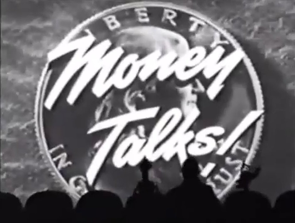 A picture of the Mystery Science Theater 3000 cast in the theater watching a backdrop of a quarter with the words "Money Talks!" overlaid.