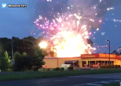 A fireworks store on fire.