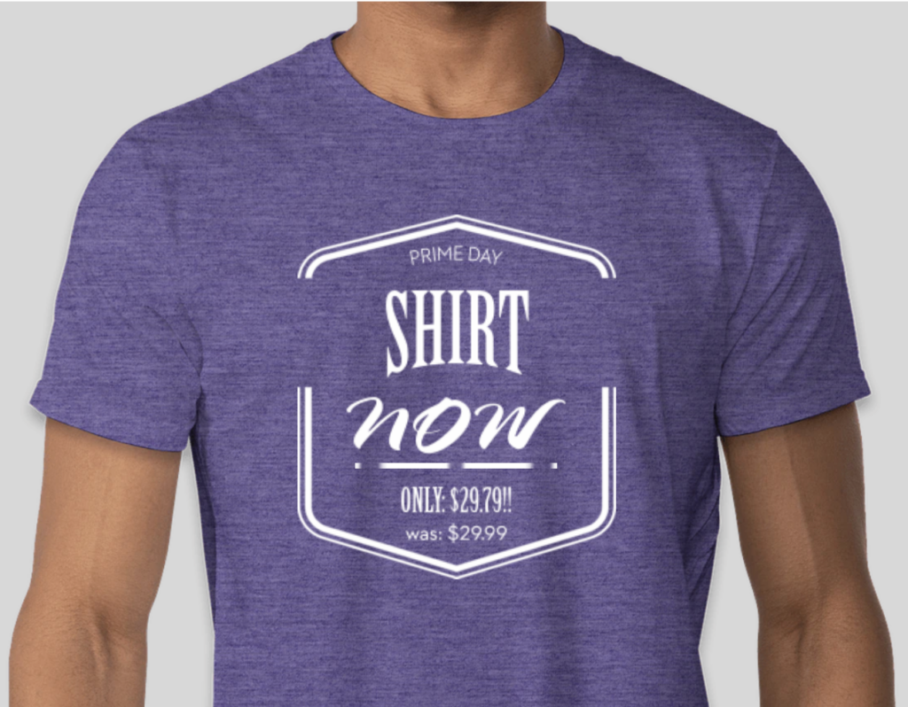 A tee shirt on a purple background that says:

PRIME DAY
SHIRT
NOW
ONLY $29.79!!
was: $29.99